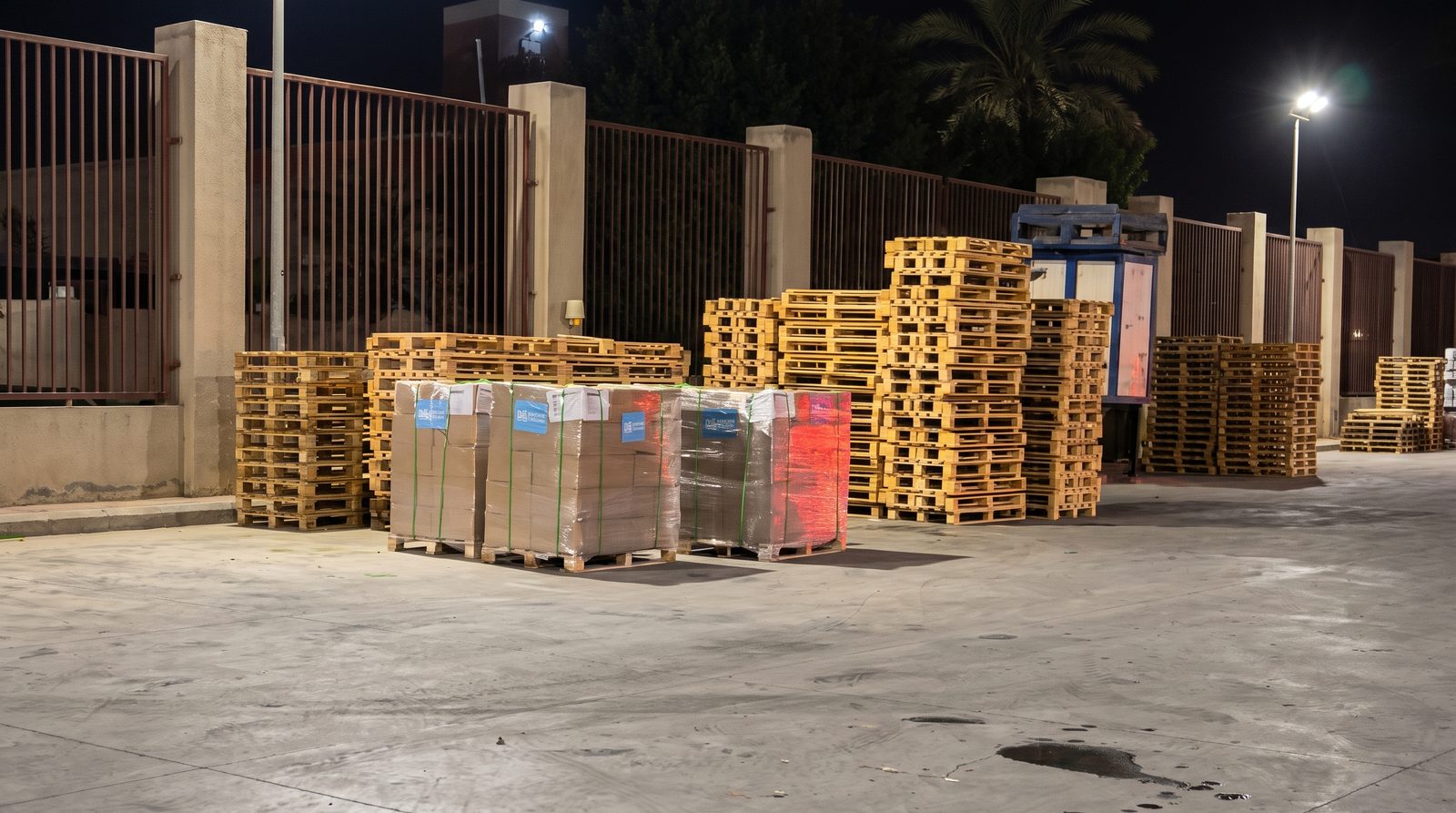 Palletized cargo staged in outdoor logistics yard